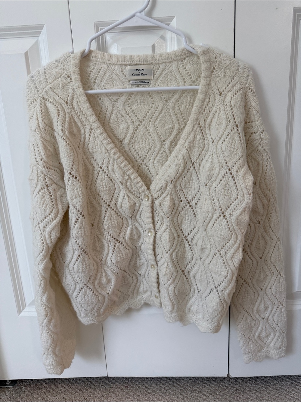 RVCA x Camille Rowe cream knit sweater